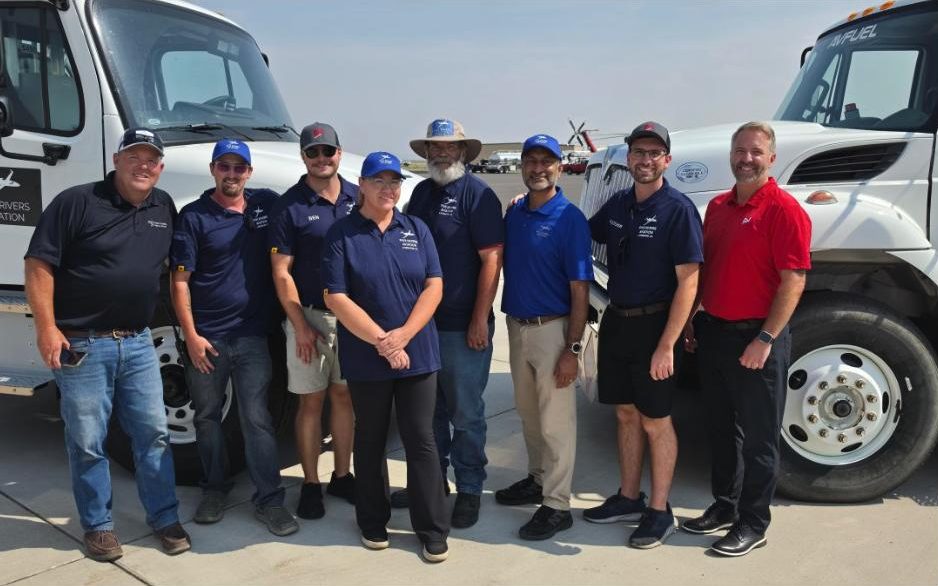 Five Rivers Jet Center and Avfuel team members in front of fuel trucks at Central Wyoming Regional Airport